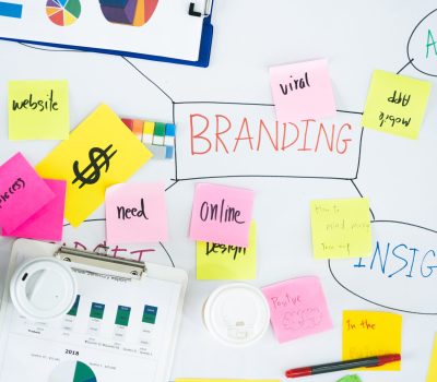 Top view of creative designer brainstorming ducument on wood table in meeting room